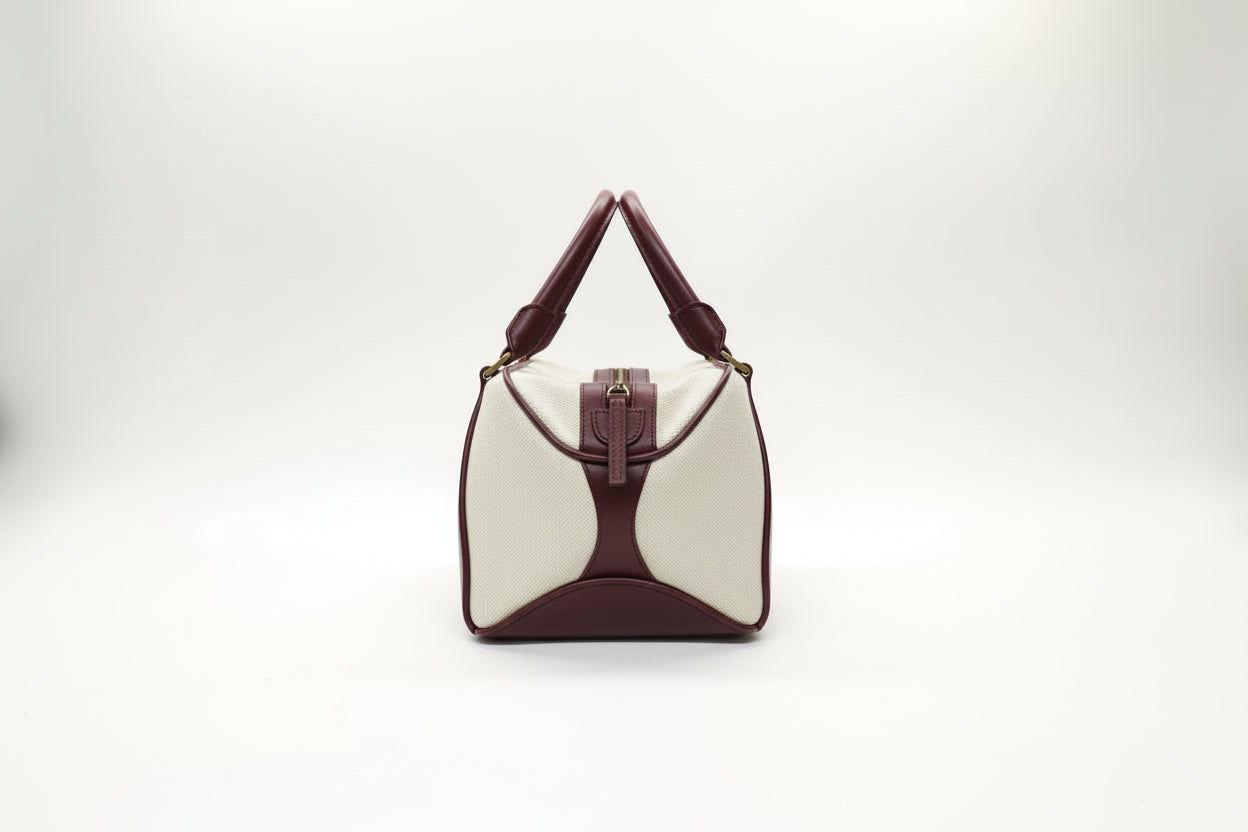 The Bea structured leather tote with canvas. - Side detail