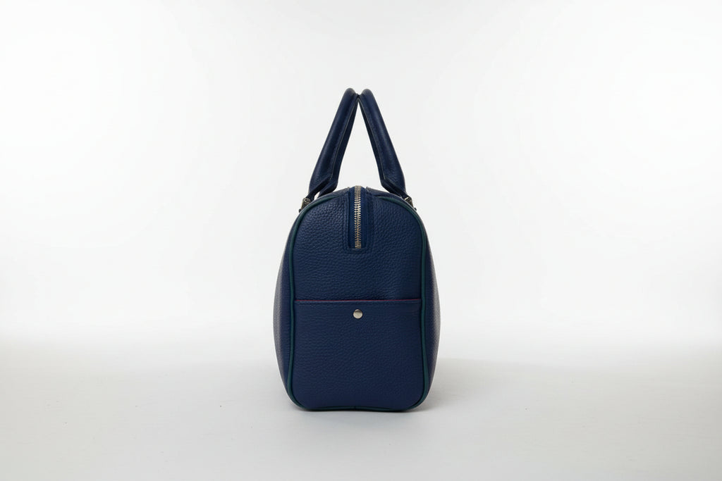 The Cassie handmade leather handbag in blueberry- side detail