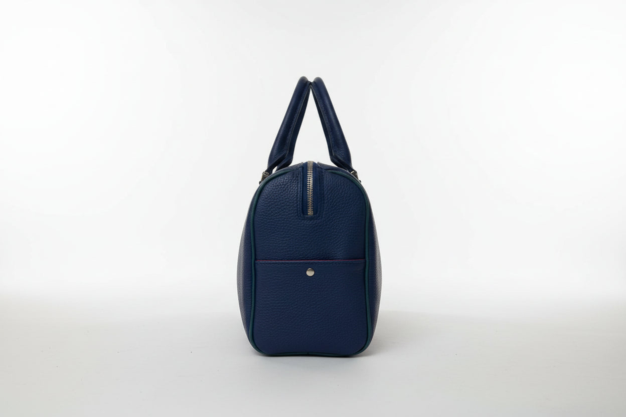 The Cassie handmade leather handbag in blueberry- side detail
