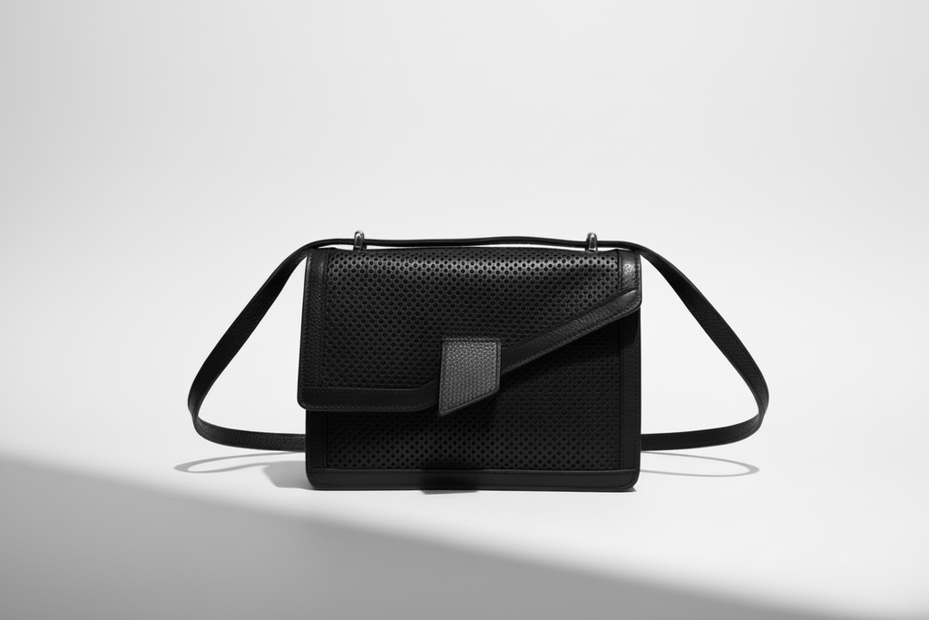 The Terry luxury handmade leather tote in Onyx preforated Italian leather - front view